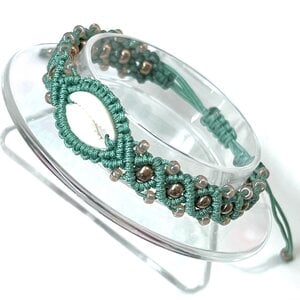 Macramé armband zeegroen met schelp