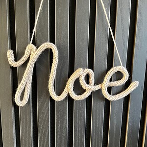 Naamhanger 3 letters