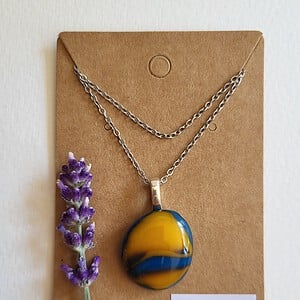 RVS ketting met uniek Blauw en Oranje glas hanger