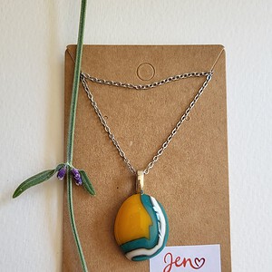 RVS ketting met uniek "Gouden Tij 002" glas hanger