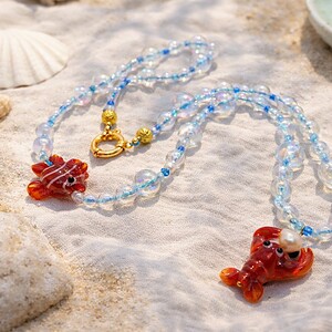 Seaside Souvenir | ketting met iriserende glaskralen