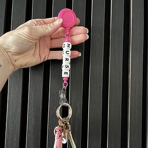 Zorg pashouder/sleutelhanger