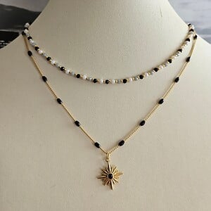 Dubbele RVS ketting – 16K goud verguld met zwarte details & zonhanger