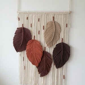 Macramw wandhanger met bladeren