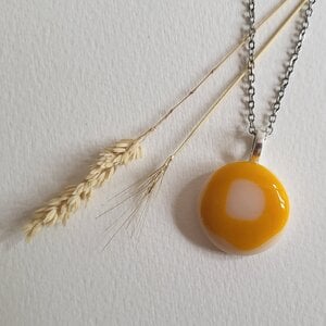 RVS ketting met uniek "Gele Golf" glas hanger