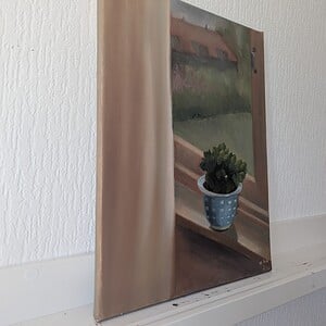 Flower by the window