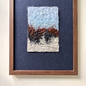 Landschap tussen berg en zee - wanddecoratie in wol