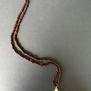 lange bruine ketting met zoetwater parel