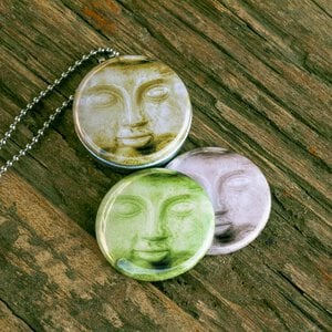 budha,buddha ketting,budha medaillon,budha gezicht,buddha face,Fotomedaillon ketting met 3 verschillende voorkanten met foto`s van budha.