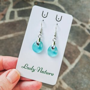 Handgemaakte glazen oorbellen, aqua blauw /azuur blauwe oorbellen.