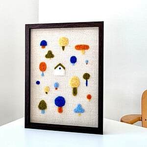 Kunstwerk van wol - It takes a village