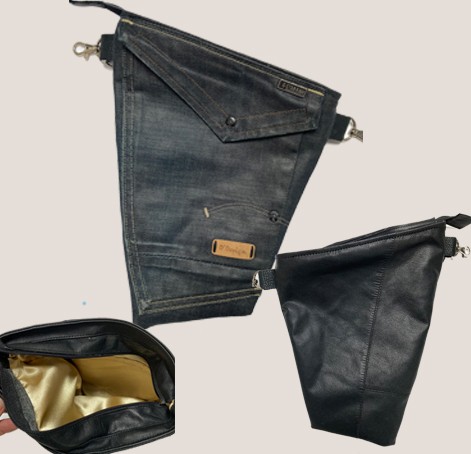 Stoere schoudertas gemaakt van denim g star spijkerbroek en zwart leer in het achterpand met gouden voering.