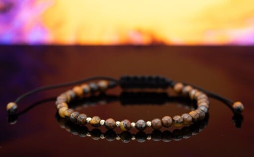 Elegante Tijgeroog armband met 14 karaat geelgouden kralen
