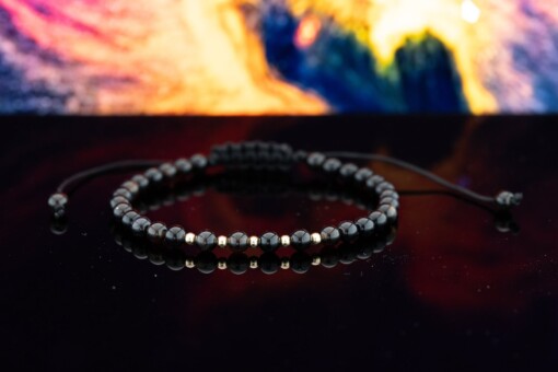 Elegante zwart onyx armband met 14 karaat geelgouden kralen 2,5 mm