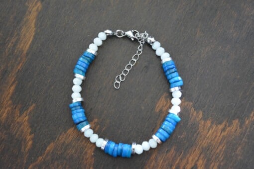 armbandje met facet kralen en disc schelp kralen