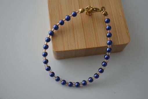 blauw met roze armbandje