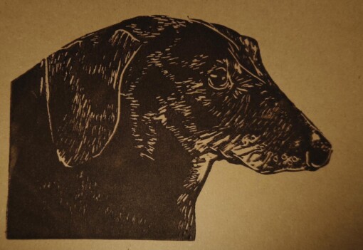 Linoprint ‘Dino de Teckel’ – handgedrukte A6 kunstkaart op offwhite of kraftpapier