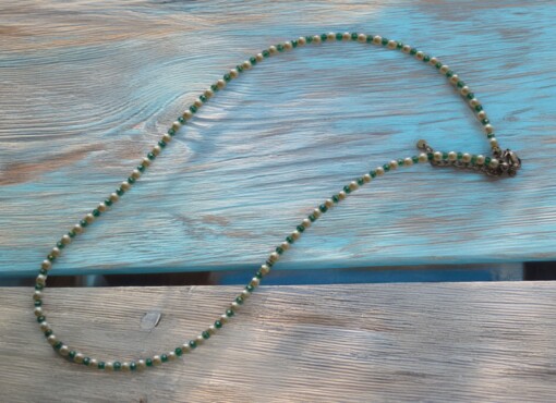 groen witte ketting van stainless steel