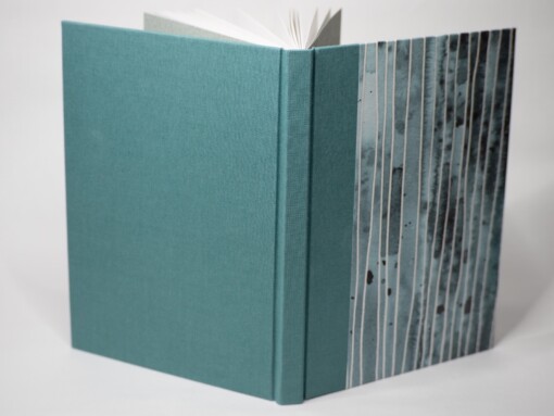 Notitie/schetsboek met linnen en omslag decoratief papier