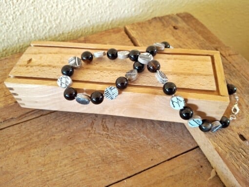 (heren of dames) ketting met kolenmijn verleden, papier en glas