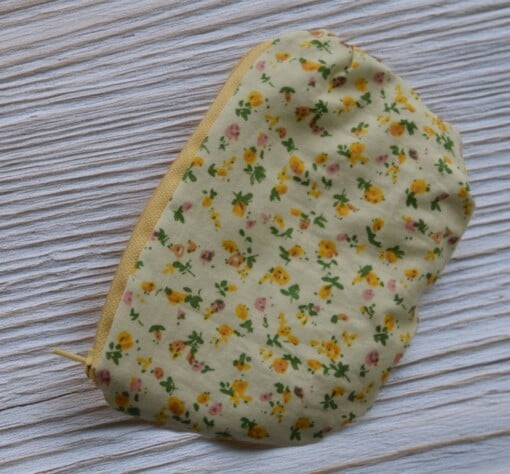 pouch met rits en bloemenmotief