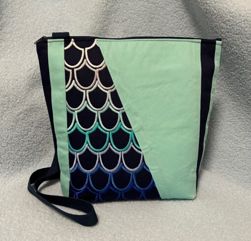 Blauw / mintgroene schoudertas