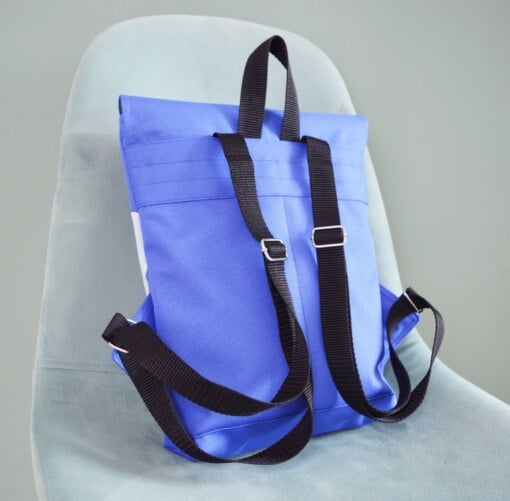 Blauwe waterdicht rugzak met magische paddestoel textiel kunstwerk