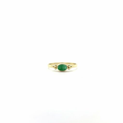 Tiny Facet Emerald Oval Triquetra Gold
