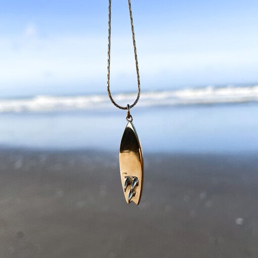 Oceaan ketting surfboard goud