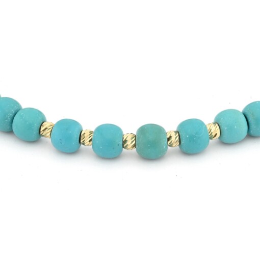 Turkoois armband met 14 karaat geelgouden kralen