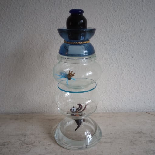 SPIN  in de AANVAL glasobject met kandelaar functie
