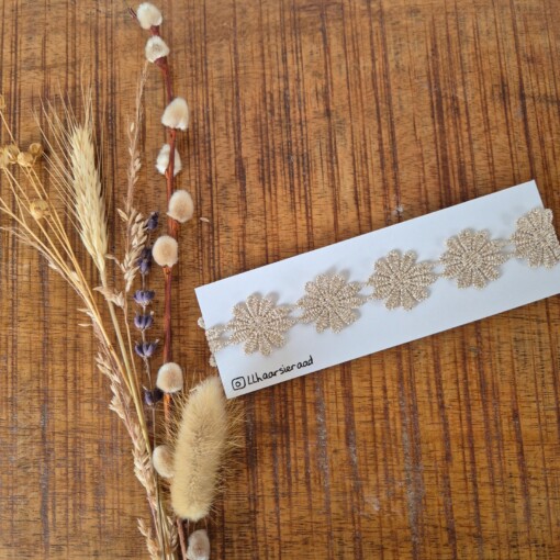 Haarbandje goud doorlopend met hartjes of bloemen