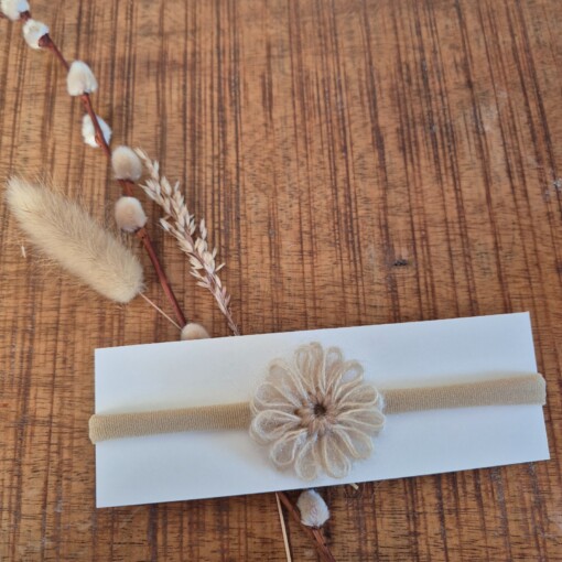 Haarbandje met wollen bloem