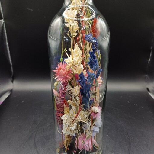 Droogbloemen in een magische fles met ledlampjes