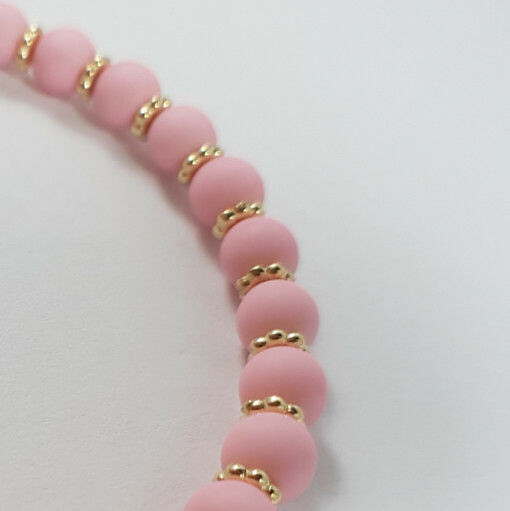 Pastel roze en goud kralen rek armband