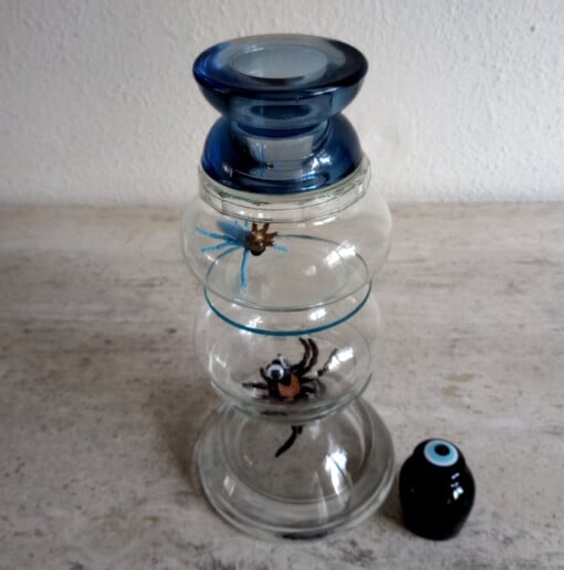 SPIN  in de AANVAL glasobject met kandelaar functie
