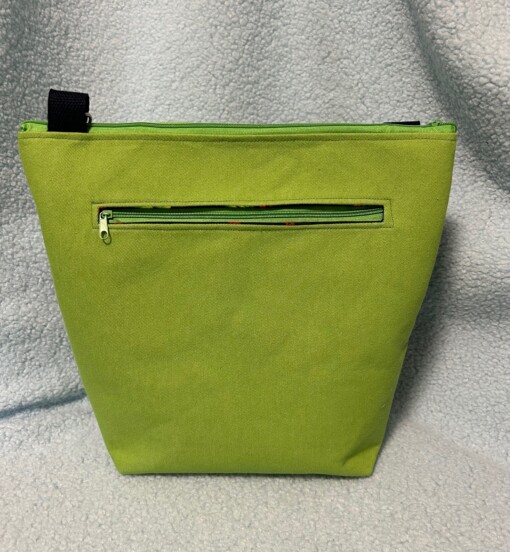 Groene schoudertas met geborduurde ruitjes