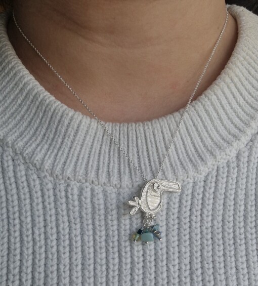 Unieke zilveren hanger toekan Noukie met turquoise kraaltjes