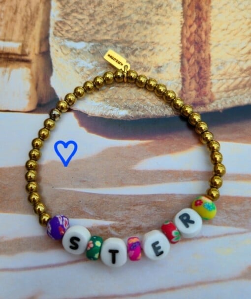 Armbanden van hematie goud kralen +woordjes