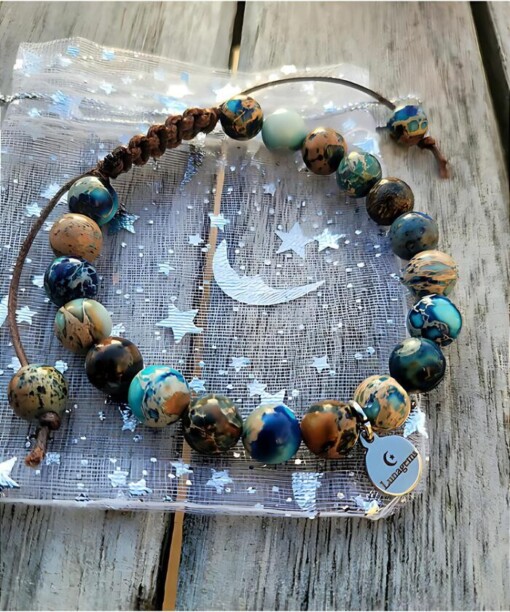 Handgeknoopte armband met gekleurde jaspis kralen