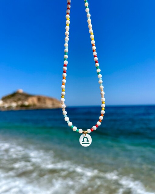Handgemaakte kinder ketting met sterrenbeeld van schelp