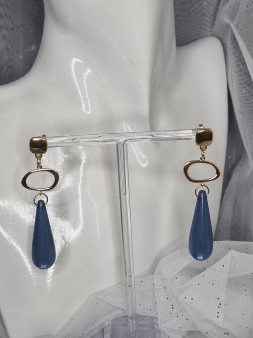 Vergulde statement oorbellen met polaris - blauw