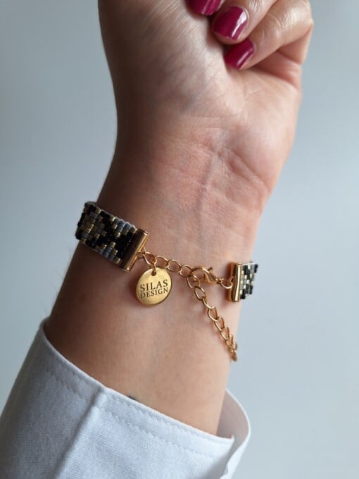 Geweven kralen armband 'Xoxo black & grey'