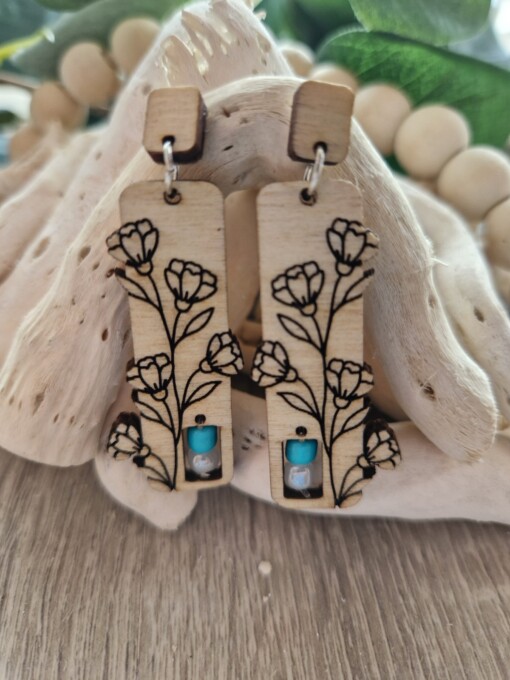 Oorbellen met bloemmotief met een spark of turquoise