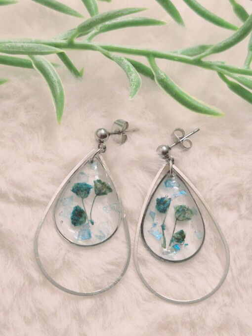 Blauwe bloemen met zilveren flokken waterdruppel Resin Oorbellen