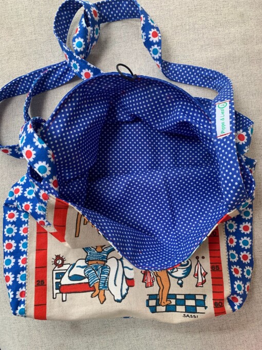 Ruime tas van vintage stoffen.
