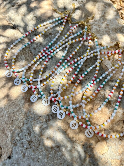 Handgemaakte kinder ketting met sterrenbeeld van schelp