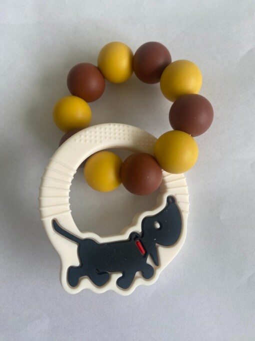 Bijtring Camel- met takkie hanger
