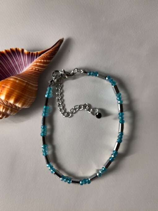 armbandje aqua blauw en antraciet