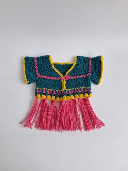 Gehaakt baby vestje | Petrol, roze en geel met roze franjes